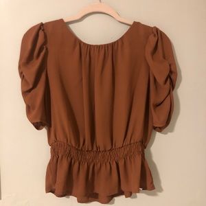 Peplum shirt with ruffled sleeves